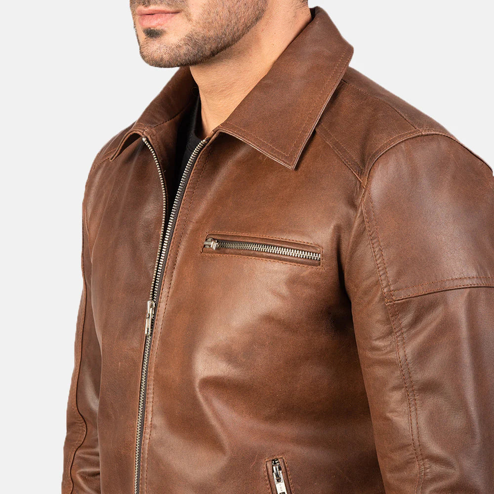 Asymmetrical lapel collar on the lavendard brown leather jacket for an authentic biker look.
