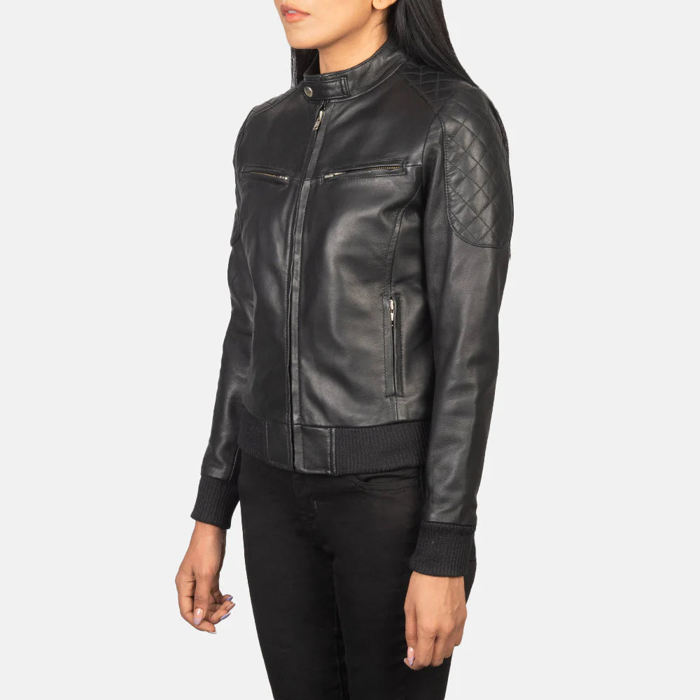 Side profile of black leather bomber jacket showing sleek silhouette
