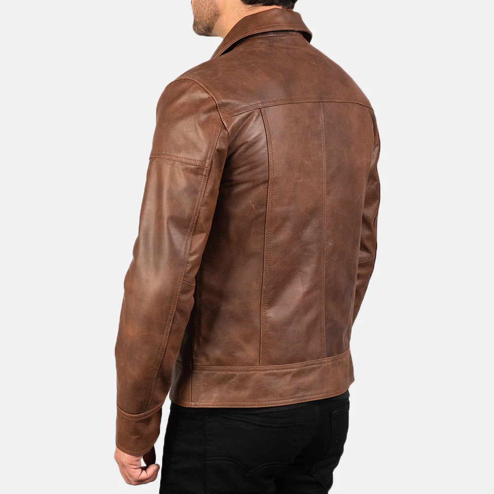 Back view of the vintage lavendard brown motorcycle jacket, showing its classic biker silhouette.
